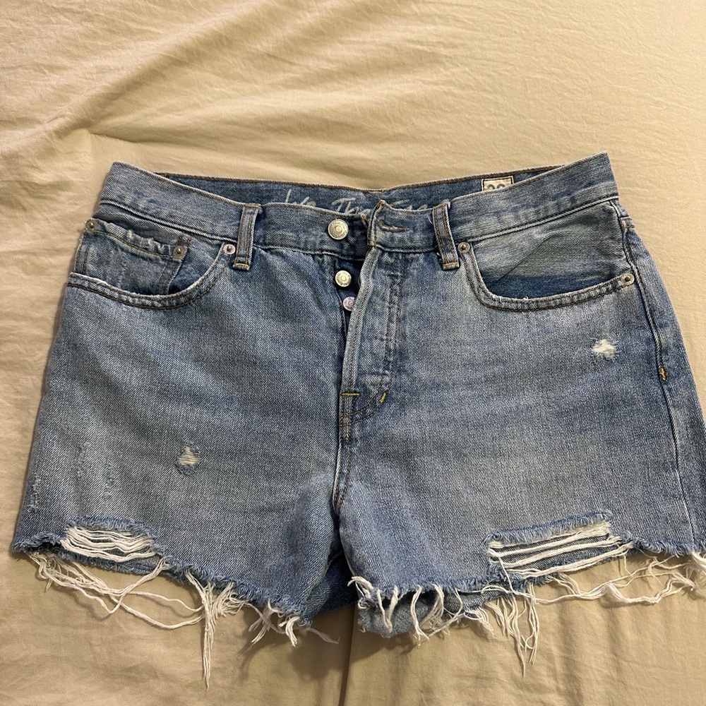 Free People Size 29 Light Wash Ripped Jean Shorts. In Good Condition!